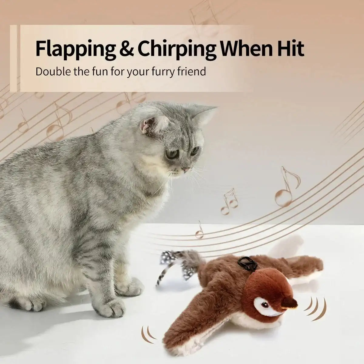 Cat playing with a toy that flaps and chirps when hit, on a light background.