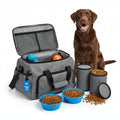 Dog travel bag with toys and food containers, accompanied by a puppy.