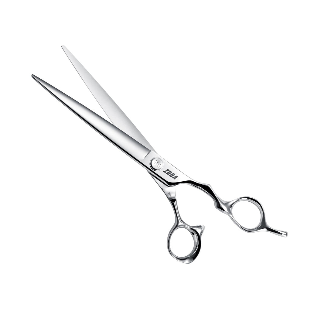 Hair cutting scissors with 'Tora' branding on a white background