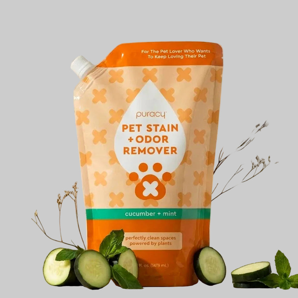 Puracy Pet Stain + Odor Remover packaging with cucumbers and mint leaves on a light background