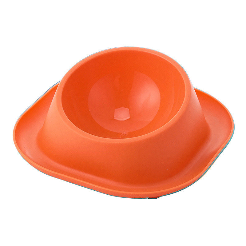 Orange pet bowl with a platform on a white background