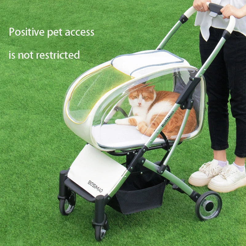 Pet stroller with a cat inside on a grassy background, featuring the brand 'BOSIMIA'.